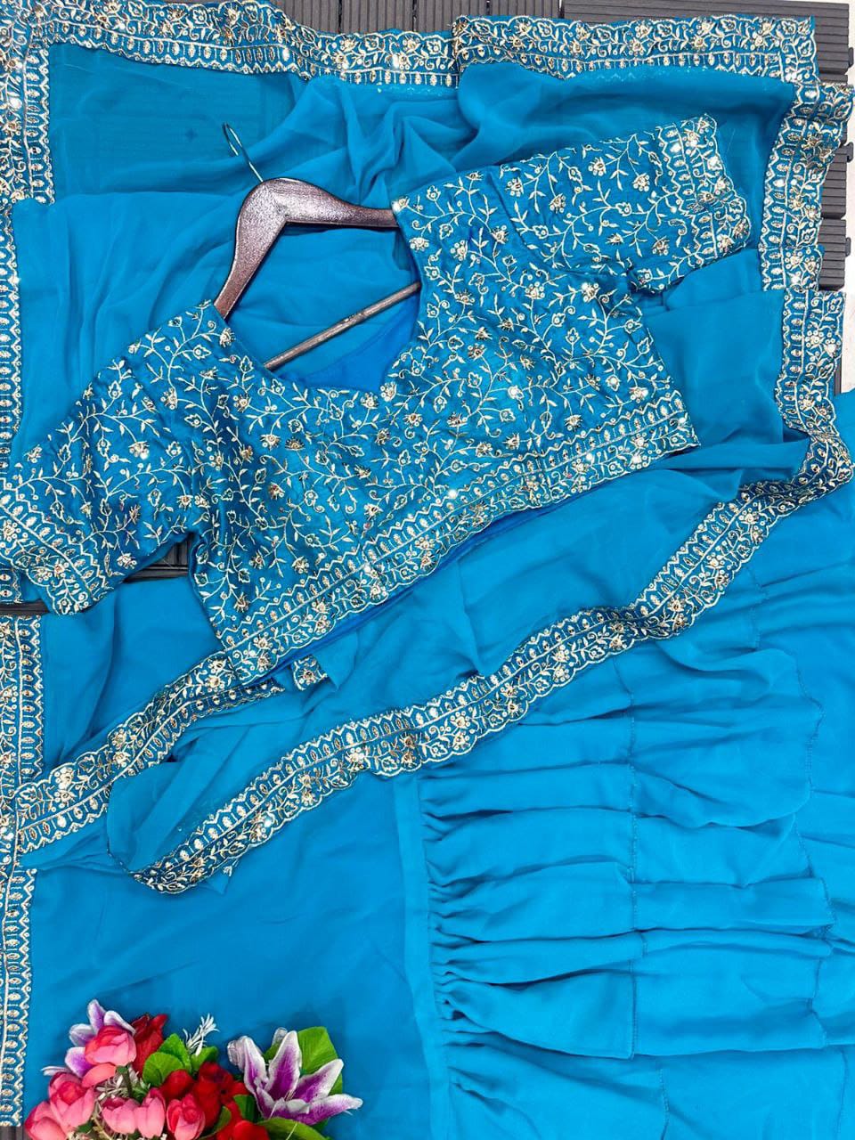 Sky Blue Georgette Ruffle Lehenga Saree with Embroidered Blouse – Graceful Party Wear Glam