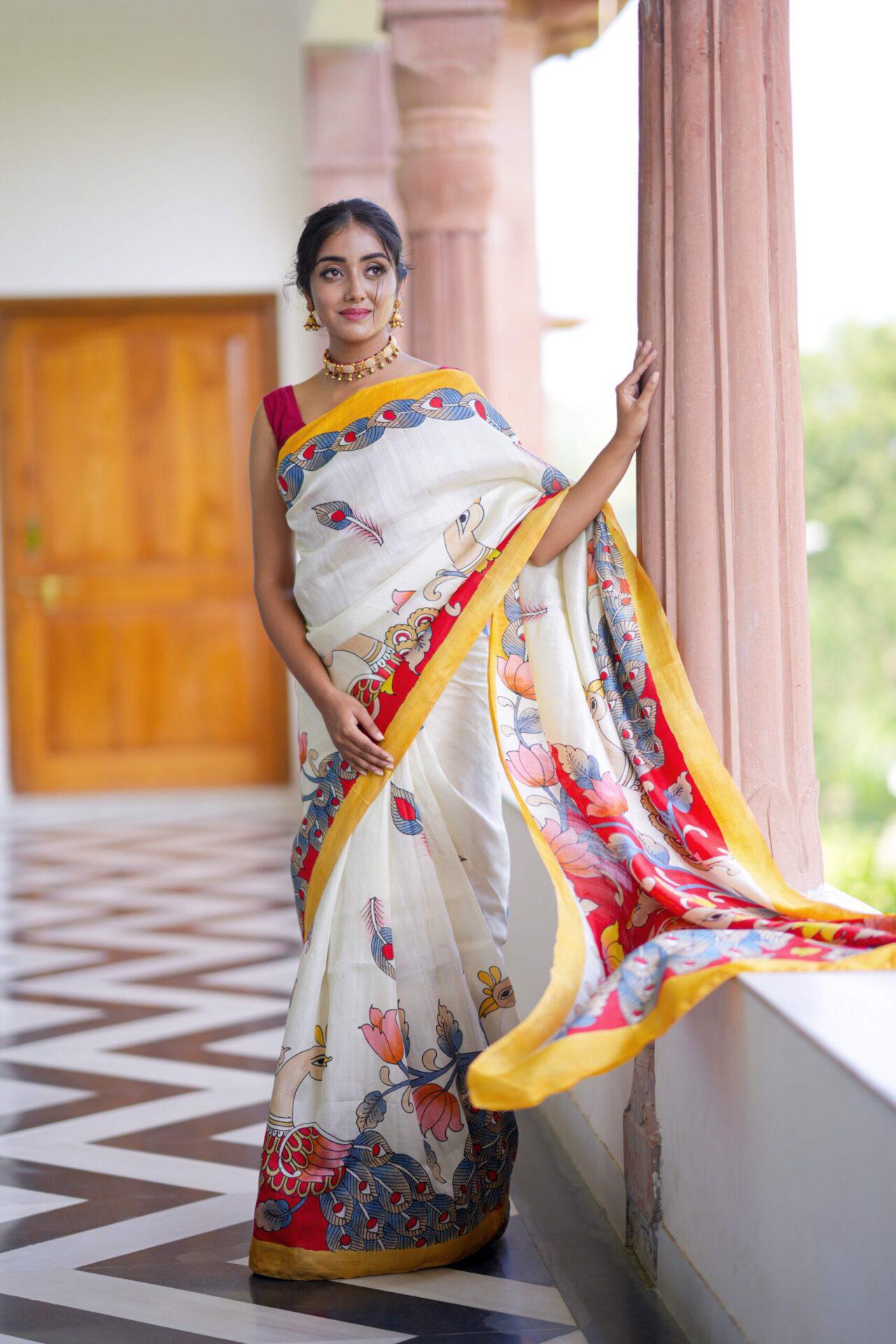 Ivory Hand-Painted Saree with Majestic Peacock & Floral Art in Yellow-Red Accents
