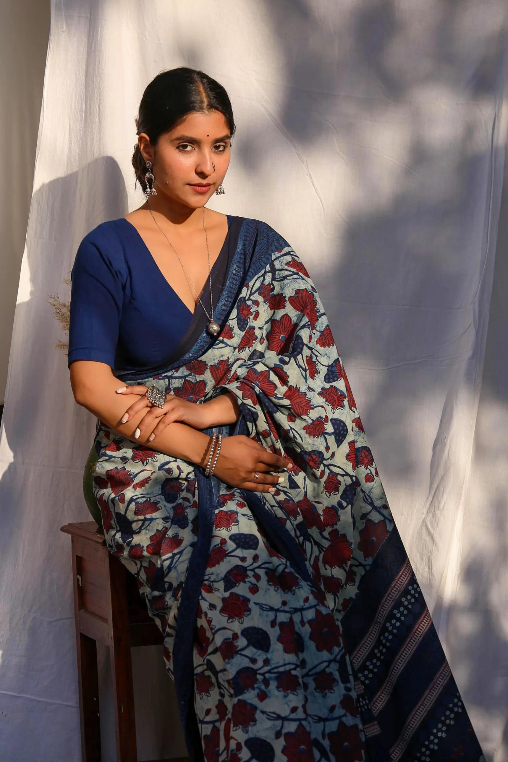 Indigo Hand-Painted Saree with Red Floral & Green Leaf Motifs